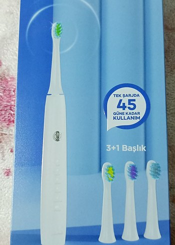 3 başlıklı şarjlı diş fırçası