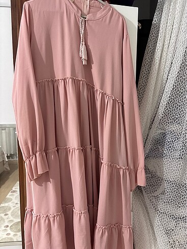 Pembe tunik