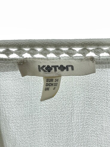 34 Beden beyaz Renk Koton Bluz %70 İndirimli.