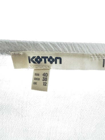 40 Beden beyaz Renk Koton Bluz %70 İndirimli.