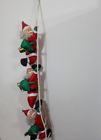 Beden Merdivene tırmanan üç Noel Baba