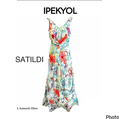İpekyol çiçekli asimetrik midi ipek elbise