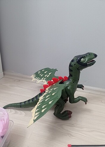 Uzaktan kumandalı sesli hareketli ışıklı dinozor 