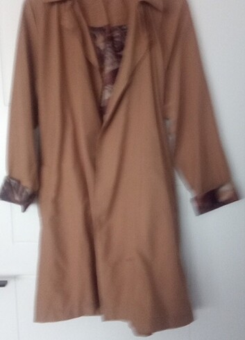 xl Beden camel Renk 40. 42 beden küçük bir etek ucunda nokta var