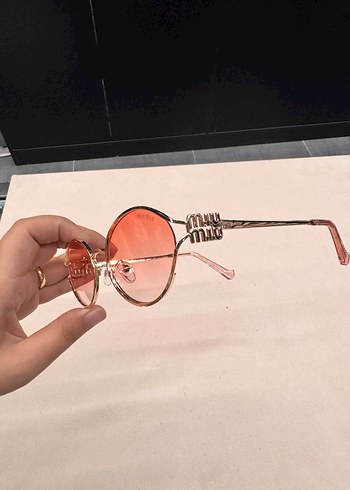 Miu Miu Şeffaf Pembe Minimalist Kadın Güneş Gözlüğü