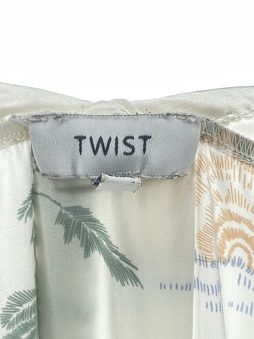 38 Beden çeşitli Renk Twist Bluz %70 İndirimli.