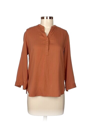Uniqlo Bluz %70 İndirimli.