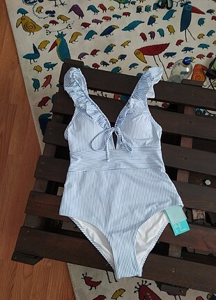 H&M marka mavi çizgili mayo 36 beden etiketi üzerinde sıfır 