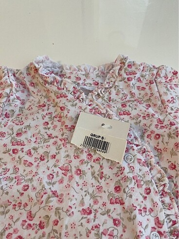 The Little White Company Çıtçıtlı kız bebek tulum