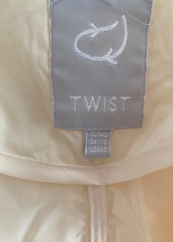 40 Beden Twist yağmurluk
