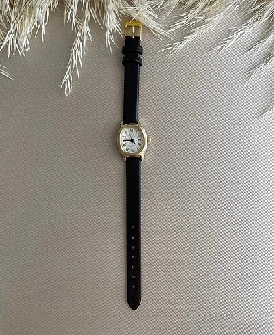 Vintage model deri kordonlu gold saat