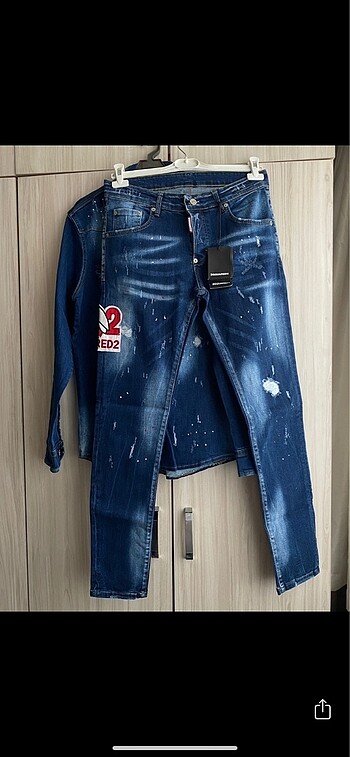 Armalı kesikli yırtıklı kot pantolon