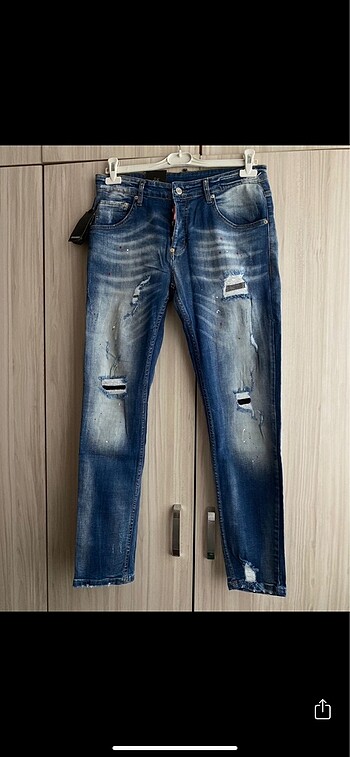 Slim jean kesikli yırtıklı kot çok düğme