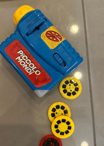 Sarı ve mavi renkli eğitici oyuncak projektör