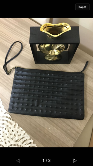 Siyah dokulu clutch