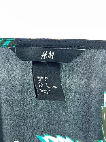 34 Beden çeşitli Renk H&M Kısa Elbise %70 İndirimli.