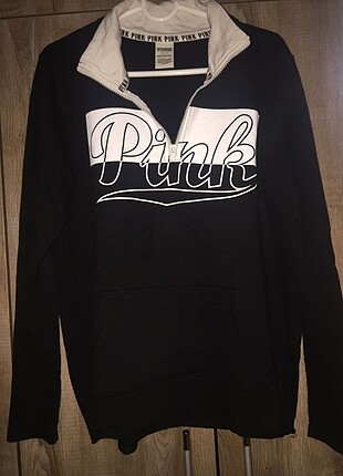 Sweatshirt fermuarlı ve ceplidir 
