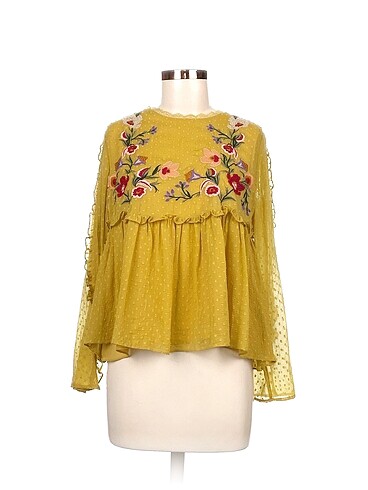 Zara Bluz %70 İndirimli.