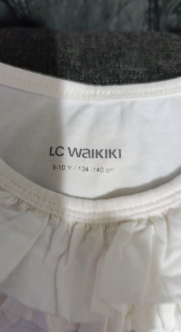 Fırfırlı Beyaz Keten Kolsuz Mini Bluz - Görsel 3