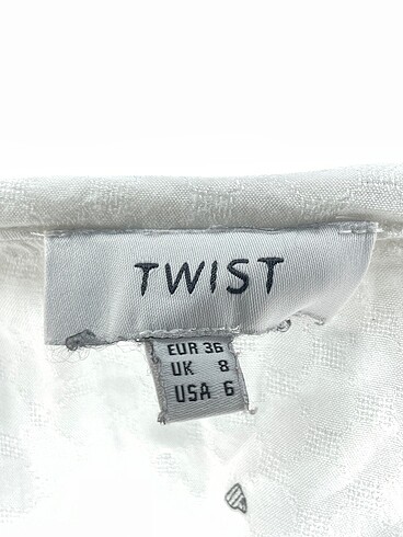 36 Beden beyaz Renk Twist Gömlek %70 İndirimli.