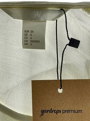 34 Beden çeşitli Renk H&M Bluz %70 İndirimli.