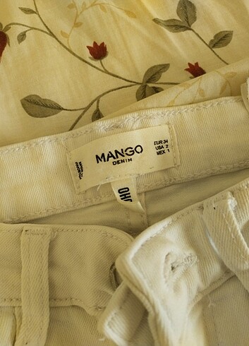 Mango 34-36 beden uyumlu beyaz jean-.Hasarı yoktur