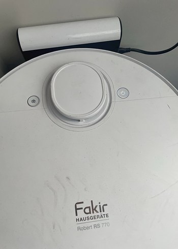 Beyaz ve gri robot süpürge - Görsel 10