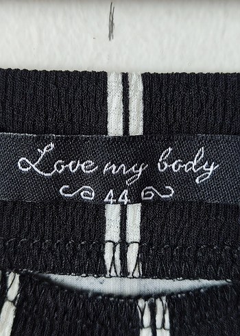 44 Beden Love My Body marka siyah üzerine beyaz çizgili etek