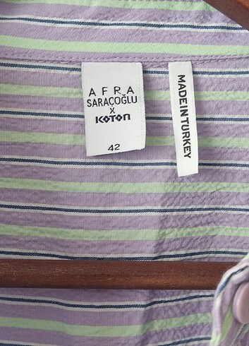 42 Beden mor Renk Koton marka Afra Saraçoğlu koleksiyonu mor renkli çizgili elbise