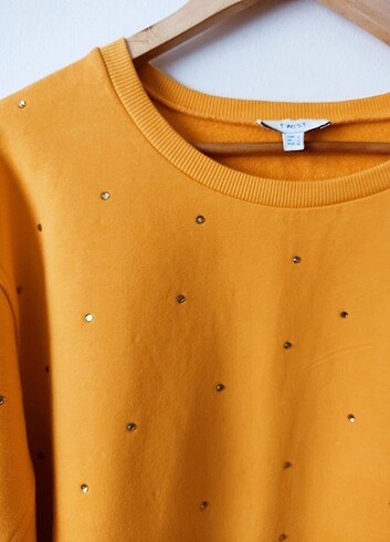 l Beden Twist marka sarı renkli taşlı sweatshirt