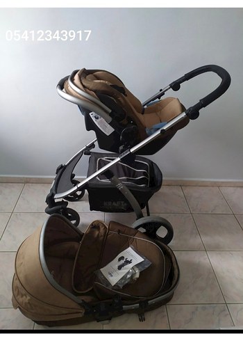 9- 36 kg Beden Bej ve gri bebek arabası