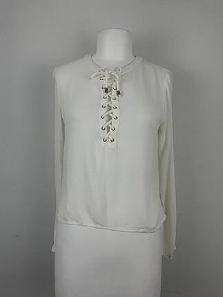 H&M Bluz %70 İndirimli.