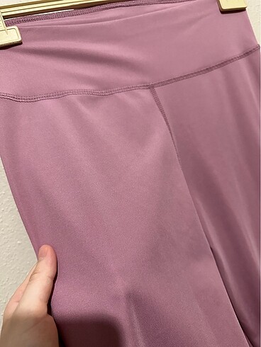 Pembe sporcu tayt