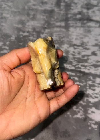 Beden Camel ve gri renkli taş fil figürin