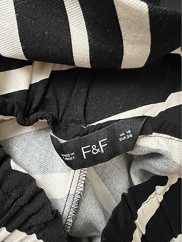 m Beden siyah Renk F&F marka 38 beden pantolon. Hiç giyilmemiştir.