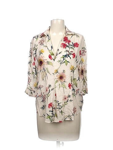 Zara Bluz %70 İndirimli.