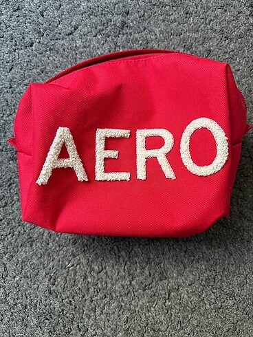 Beden Aero kırmızı makyaj çantası