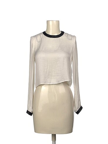 Zara Bluz %70 İndirimli.