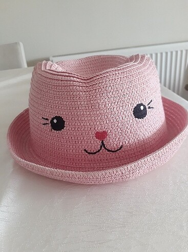 Pembe çocuk sapka