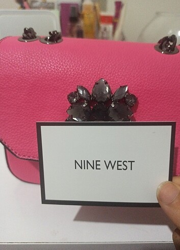 Beden Nine West fuşya kol çantası