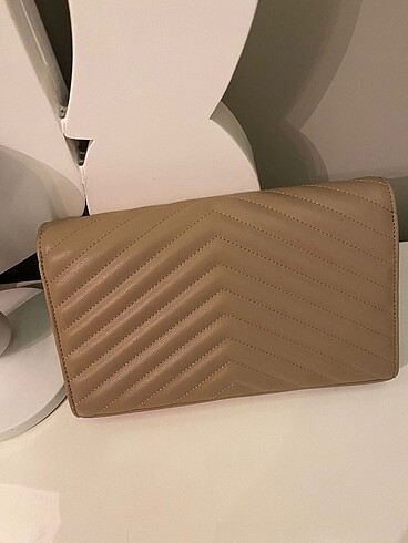 Beden Clutch, portföy
