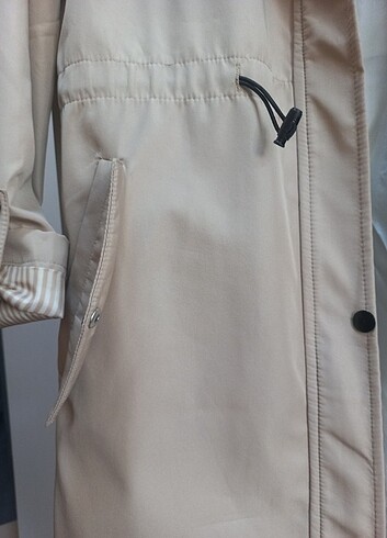 s Beden Trenchcoat, marka temsilidir
