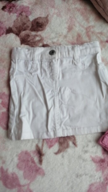 LC Waikiki 3 4 yas kırmızı ve beyaz olan etek pembe olan şorttur 3 lu sekıl