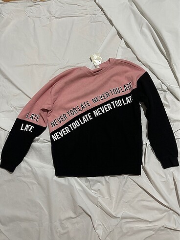 Defacto pembe siyah kazak xs etiketli
