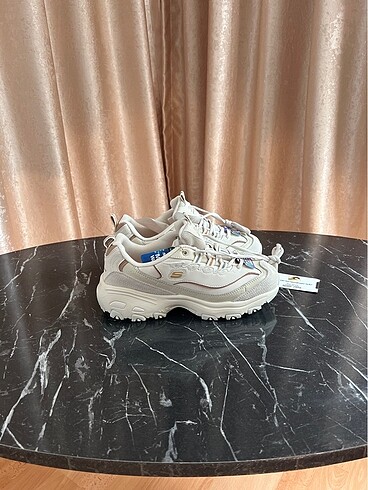 Skechers Cream gold