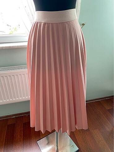 Pembe pilisesi etek