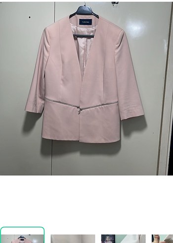Fabrika Sikligin Simgesi Acik Pembe V Yaka Ceket