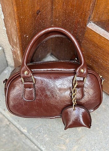 Bershka uzun askılı mini el çantası ölçü 24*11cm