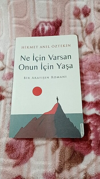 Ne için varsan onun için yaşa kitap