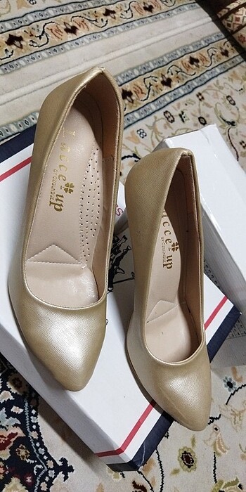 Gold stiletto 